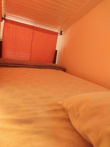 Katil atau katil-katil dalam bilik di É Hostel