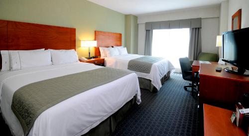 Postel nebo postele na pokoji v ubytování Holiday Inn Express & Suites Toluca Zona Aeropuerto by IHG