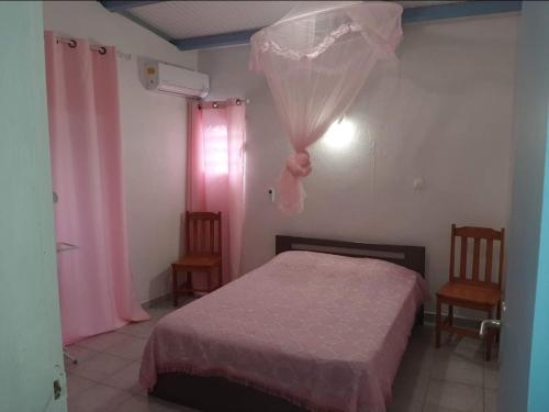 Postel nebo postele na pokoji v ubytování Villa REMY