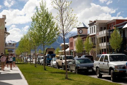 a street in a small town with a clock tower at Surf Hotel & Chateau in Buena Vista