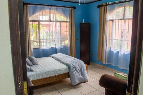 Ein Bett oder Betten in einem Zimmer der Unterkunft Tico House Bed & Breakfast