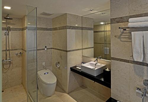 Koupelna v ubytování Gino Feruci Braga by KAGUM Hotels