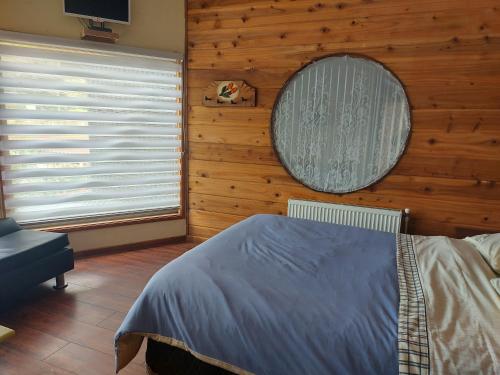 Ένα ή περισσότερα κρεβάτια σε δωμάτιο στο Cabañas La Travesía