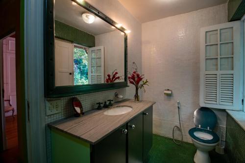 Ein Badezimmer in der Unterkunft Villa Alexandrino