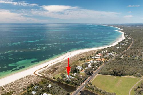 an aerial view of a beach with a red arrow at The Beach Club in Vasse