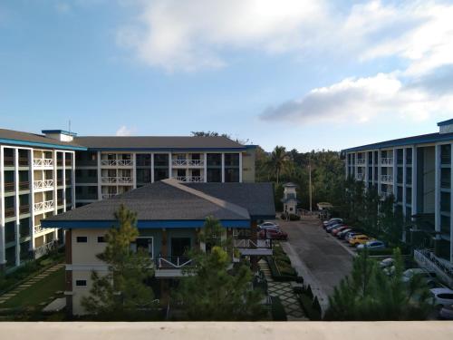 arial view of a building with a parking lot at Pine Suites Tagaytay 2BR Penthouse with Netflix and FREE parking in Tagaytay