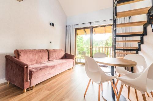 Χώρος καθιστικού στο Apartamenty Gajówka- rowery, plac zabaw, sauna, jacuzzi