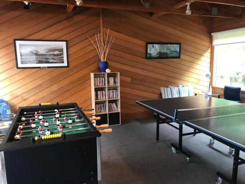 a room with a pool table and ping pong ball at 5 Whitecrest Great Ocean Road Resort - Ocean Views in Apollo Bay