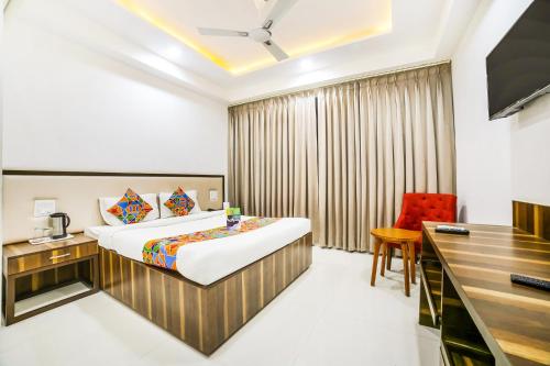 Postel nebo postele na pokoji v ubytování FabHotel Prime Sapphire Inn