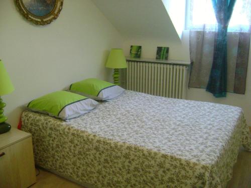 Cama o camas de una habitación en Maison d'hôtes - Borisov