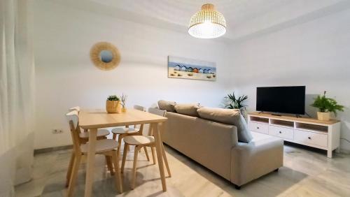 TV a/nebo společenská místnost v ubytování Botánic Suite Malaga