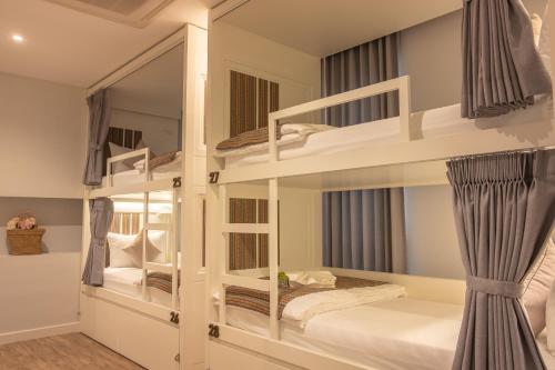 Postel nebo postele na pokoji v ubytování Lanna Bonita Boutique Hotel