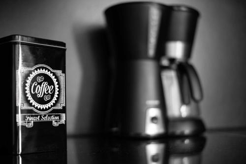 a can of coffee sitting on top of a table at Filippos Acharnes Elegance in Akharnaí
