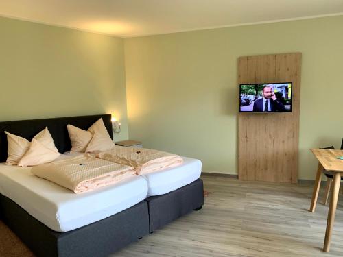 Postel nebo postele na pokoji v ubytování Hotel Schmidt's Hoern