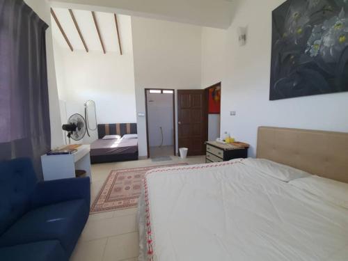 Katil atau katil-katil dalam bilik di Neblina House