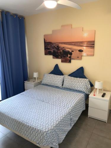 Postel nebo postele na pokoji v ubytování Cozy apartment Playa Las Vistas. Free Wifi.