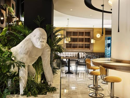 a statue of a polar bear in a restaurant at Esperides Beach Resort in Faliraki
