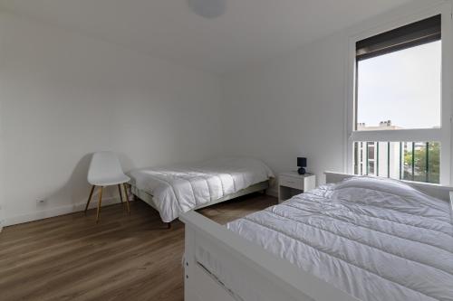 Postel nebo postele na pokoji v ubytování Ombeline