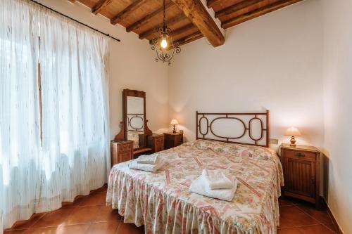 Postel nebo postele na pokoji v ubytování Borgo Villa a Sesta