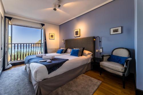 Posteľ alebo postele v izbe v ubytovaní LA CONCHA BEACHVIEW by SWEET HOME SAN SEBASTIAN