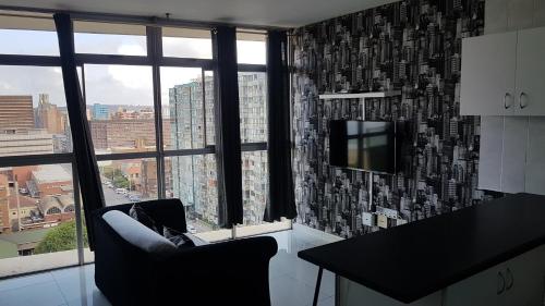 Kuchyň nebo kuchyňský kout v ubytování 10 South Apartments