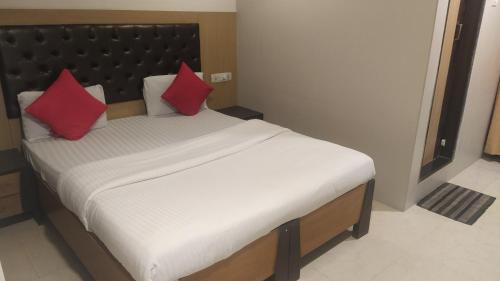 Postel nebo postele na pokoji v ubytování Hotel Palm Star