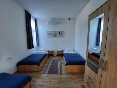 Katil atau katil-katil dalam bilik di Orchidea Apartmanház