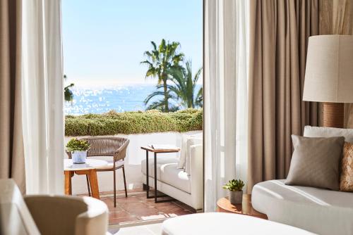 a hotel room with a view of the ocean at Puente Romano Beach Resort in Marbella