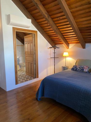 Postel nebo postele na pokoji v ubytování Casa del torno de las monjas
