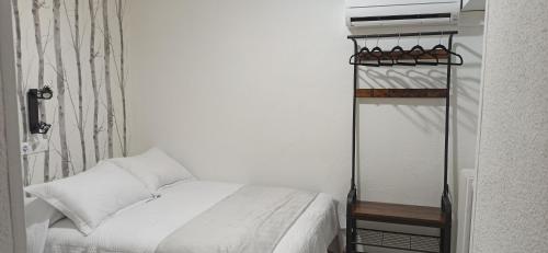 Een bed of bedden in een kamer bij Rincón Extremeño