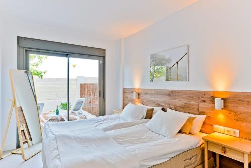 Кровать или кровати в номере Baviera Hills 59