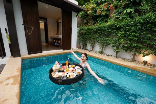 Bazén v ubytování Mimosa Resort & Spa nebo v jeho okolí