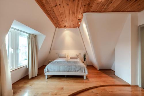 Krevet ili kreveti u jedinici u objektu Villa Mercator - Nieuwpoort-Bad