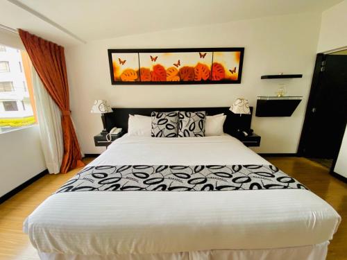 Postel nebo postele na pokoji v ubytování Hotel Marbella Chico