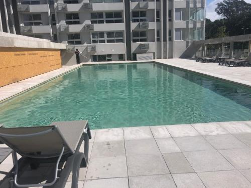 Πισίνα στο ή κοντά στο Punta de Este:open Pool and índole Pool,gym,Netflix,aire,garage
