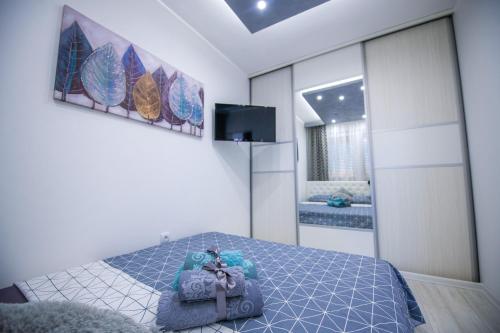 Postel nebo postele na pokoji v ubytování Apartman Nina II