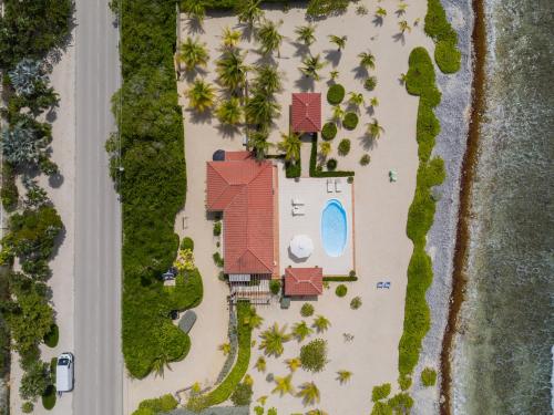 an aerial view of a resort with a swimming pool at Le Soleil D'or in Cayman Brac