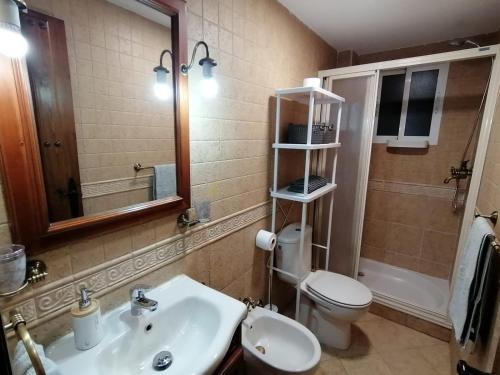 A bathroom at Spacious Apartment