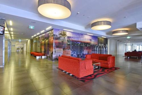 El vestíbulo o zona de recepción de ZEN CITY & SEA Executive 1-BR Suite in Darwin CBD