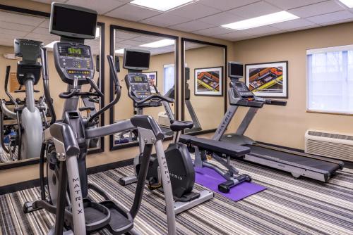 a gym with treadmills and elliptical machines at Candlewood Suites Paducah by IHG in Paducah
