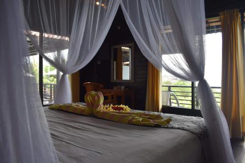 Katil atau katil-katil dalam bilik di Bali Belva