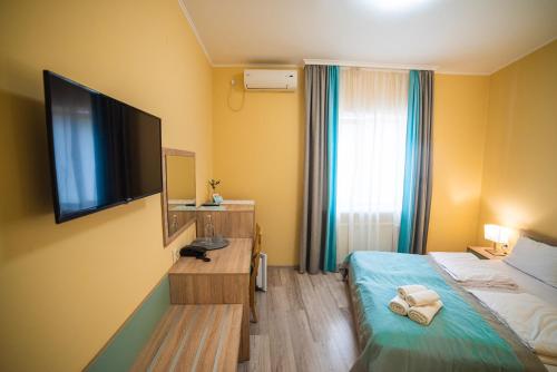 Μια τηλεόραση ή/και κέντρο ψυχαγωγίας στο Coin Inn