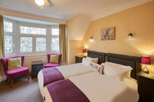 Postel nebo postele na pokoji v ubytování Acorn Lodge Harrogate