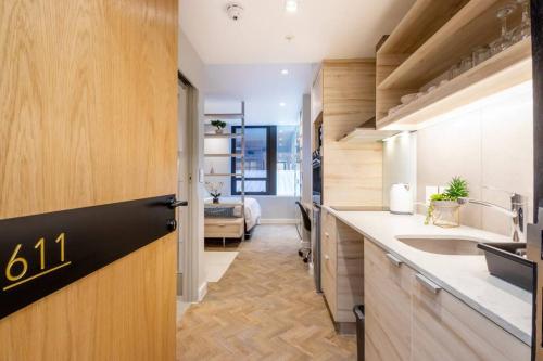 a kitchen with a sink and a counter top at #AlimamaSpaces The Foreshore Haven in Cape Town