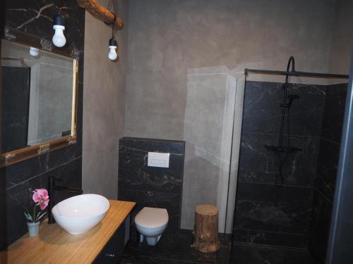 Kúpeľňa v ubytovaní Apartament Kołobrzeska
