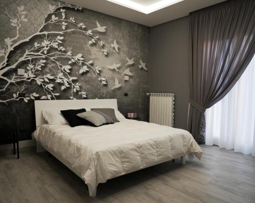 Katil atau katil-katil dalam bilik di B&B La Maddalena