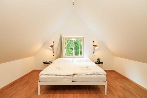 מיטה או מיטות בחדר ב-Katlov Homes