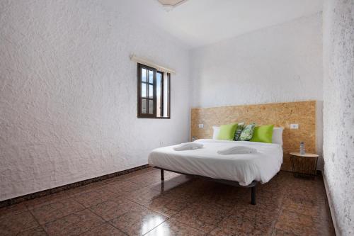 Giường trong phòng chung tại Villa Antonia