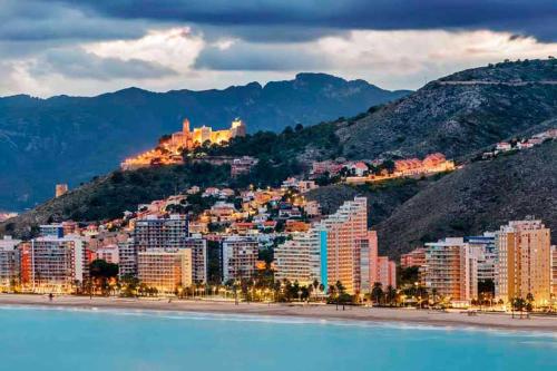 a city on the shore of a body of water at Apto POSEIDON CON PARKING EN EDIFICIO SUBTERRANEO in Cullera