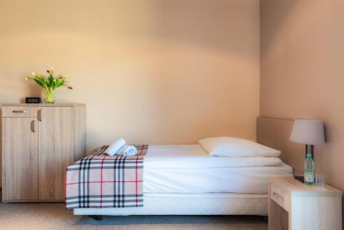 Hotel Dobre z Lasuにあるベッド